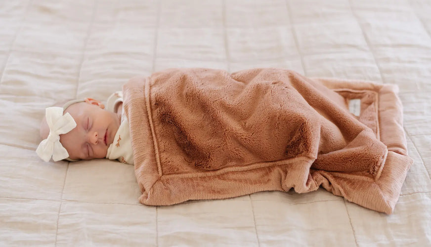 The First Embrace: Why a Receiving Baby Blanket Matters More Than You Think