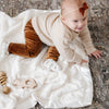 Soft and cozy receiving blanket, perfect for wrapping your baby in gentle warmth.