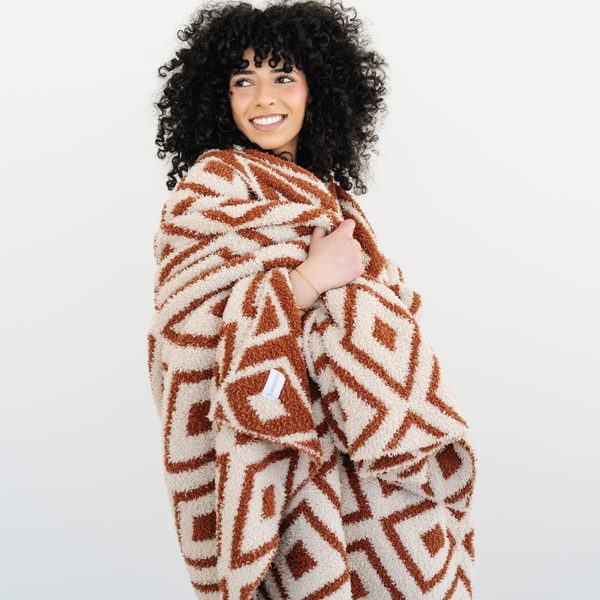 Woman wrapped in Khmer double layer bamboni throw blanket. 