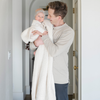 A father holds his little girl in a buttery-soft Saranoni blanket, featuring a breathable, plush waffle texture in a soothing white hue. This luxury toddler blanket is the best kids blanket as a baby blanket or toddler blanket—perfect as a cozy blanket for snuggles or a must-have infant blanket. Designed for softness and comfort, this plush toddler blanket makes an ideal toddler gift. Enjoy this luxury blanket!