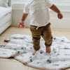 Kids’ bamboo rayon muslin quilt with a vibrant pattern, offering a lightweight and cozy option for naps, playtime, and bedtime.