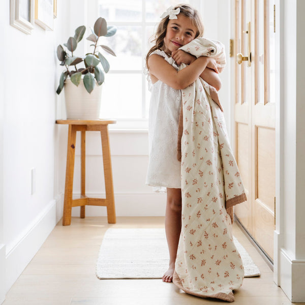 Gentle and breathable kids' bamboo rayon muslin quilt, featuring an adorable pattern that brings joy to any room.