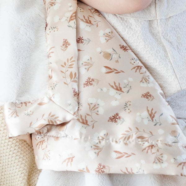 Beautiful floral toddler blanket with a plush front and a satin back, designed to wrap your little one in warmth and comfort with a touch of silky elegance.