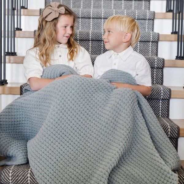 Close-up of Elm Waffle Knit Toddler blanket showing its textured pattern