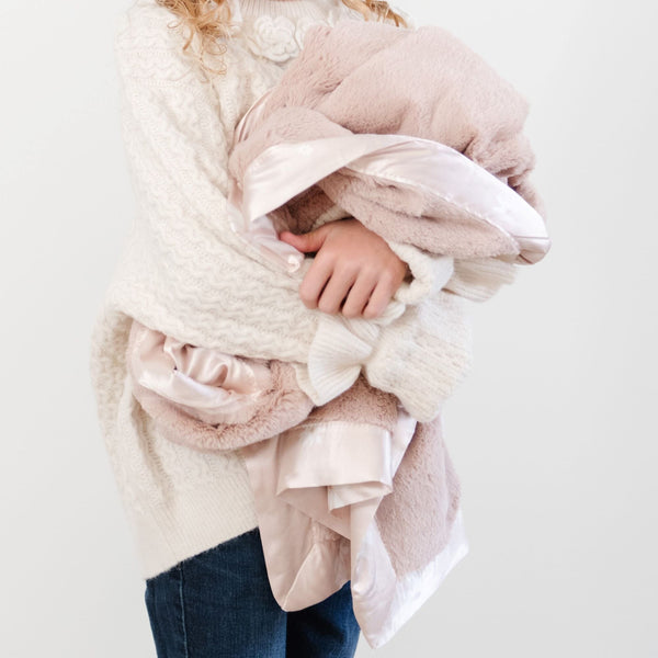 Soft and soothing receiving blanket, designed to keep your little one warm and comfortable.