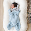 Baby boy in super soft, light blue BAMBONI® MINI BLANKETS - Saranoni