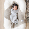 Sweet baby boy sleeping on super cozy BAMBONI® MINI BLANKETS - Saranoni