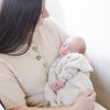 Mom soothing baby in extra soft Buttermilk BAMBONI® RECEIVING BLANKETS - Saranoni