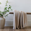 Beautiful wooden bench and plant with comfy Birch BAMBONI® THROW BLANKETS - Saranoni