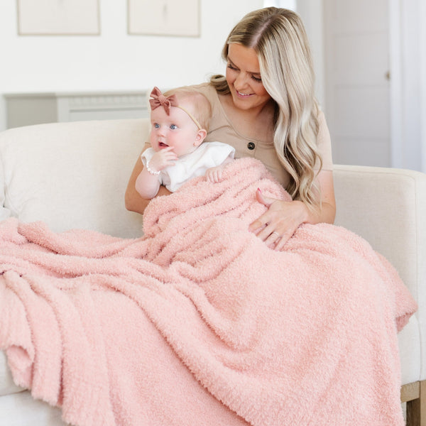 Mom and adorable new baby snuggling with beautiful Peach BAMBONI® XL BLANKETS - Saranoni