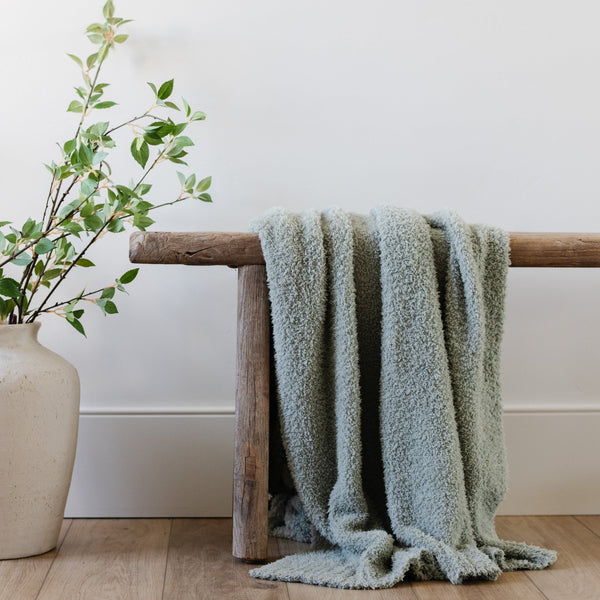 Beautiful blanket draped over wooden bench - SAGE BAMBONI® XL BLANKETS - Saranoni