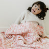 Soft and cozy bamboo rayon muslin quilt with a playful pattern, perfect for keeping your little one warm and comfortable.