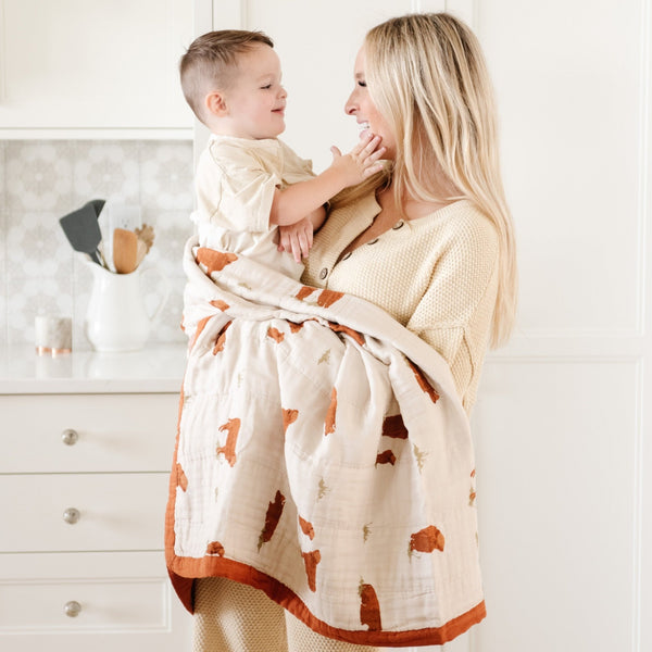 Beautifully patterned cow print bamboo rayon muslin quilt, offering a lightweight, airy feel with a touch of elegance, perfect for snuggling with your little ones.