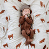 Soft and breathable bamboo muslin swaddle, perfect for wrapping your baby in gentle comfort.