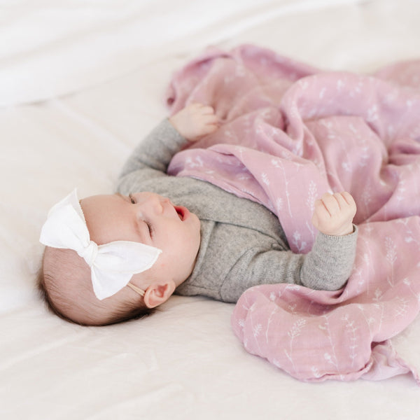 Plush, soft, and luxurious baby swaddle, offering a snug and cozy wrap for your newborn.