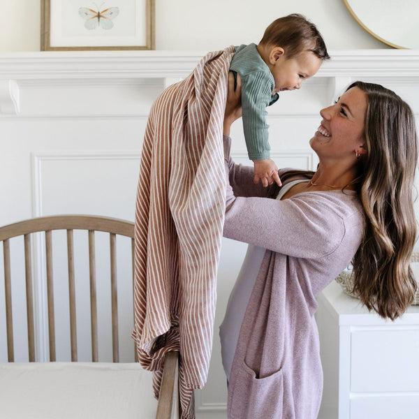 Luxurious and cozy baby swaddle, designed to cradle your baby in soft, plush comfort.