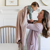 Luxurious and cozy baby swaddle, designed to cradle your baby in soft, plush comfort.