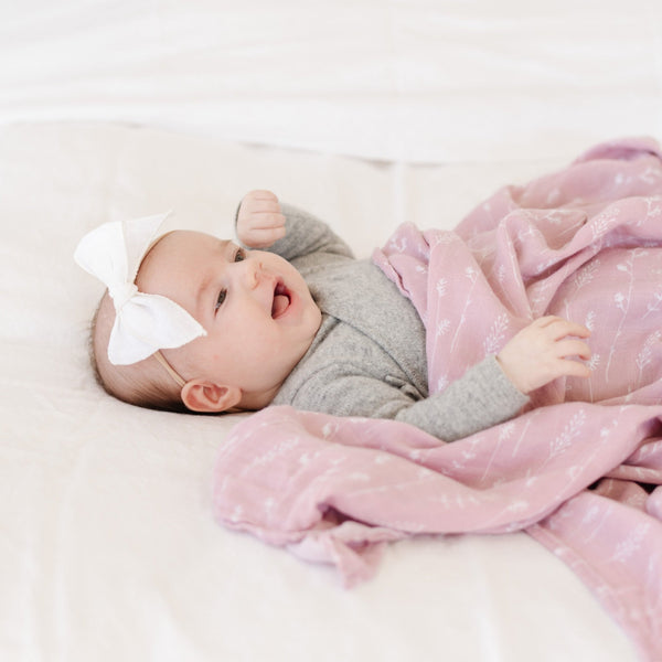 Luxuriously cozy baby swaddle, crafted to keep your little one warm and comfortable.