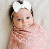 Lightweight bamboo muslin swaddle, designed to keep your baby cozy and cool with a soft, airy feel.