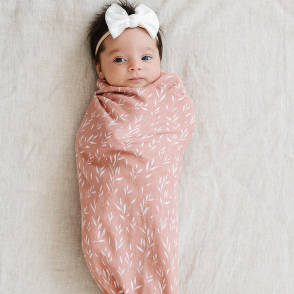 Lightweight bamboo muslin swaddle, designed to keep your baby cozy and cool with a soft, airy feel.