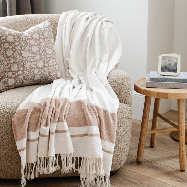 Soft chenille fringe blanket displayed in a charming living room - Saranoni