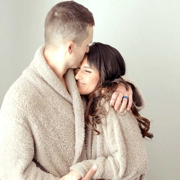 Husband and wife hugging, both wearing super soft, Taupe COZY BAMBONI ROBES - Saranoni