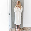 Woman laughing and holding on to beautiful Ivory COZY BAMBONI ROBES - Saranoni