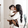 Mom and little girl wrapped up in super soft and stretchy Classic Leopard DOUBLE-LAYER BAMBONI® MINI BLANKETS - Saranoni