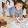 Little baby boy playing in the kitchen with extra soft Gray Leopard DOUBLE-LAYER BAMBONI MINI BLANKETS - Saranoni