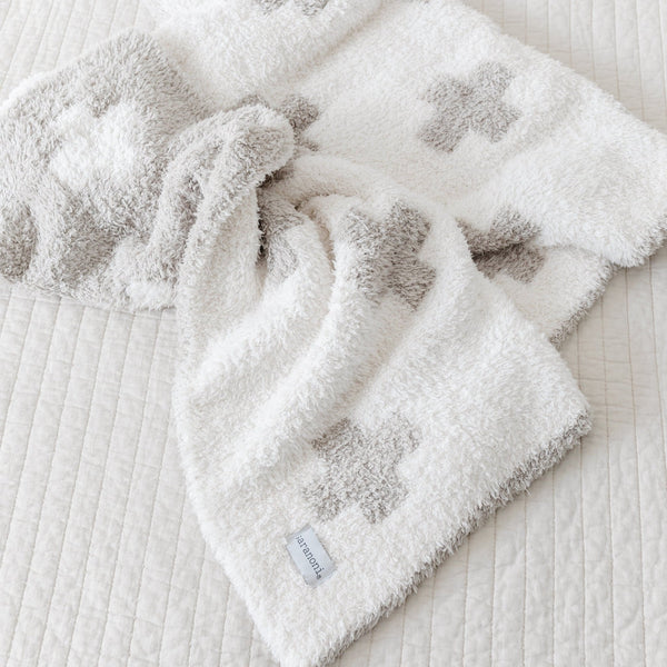 Up close detail of beautiful, neutral, Swiss Cross DOUBLE-LAYER BAMBONI MINI BLANKETS - Saranoni