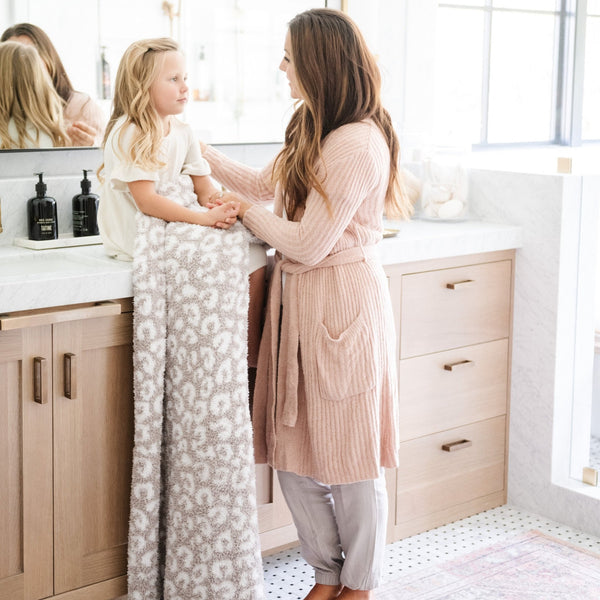 Mom and daughter in the bathroom with beautiful decor-- Gray Leopard DOUBLE-LAYER BAMBONI THROW BLANKETS - Saranoni