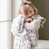 Little girl snuggling into beautiful, cozy and stretchy Gray Leopard DOUBLE-LAYER BAMBONI® TODDLER BLANKETS - Saranoni