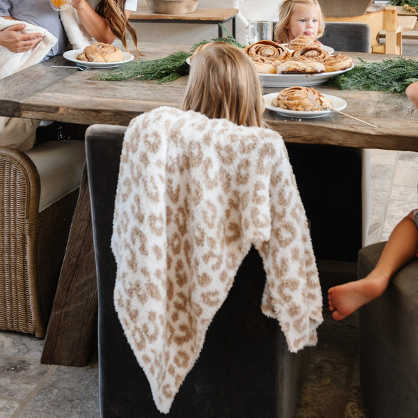 Beautiful table scape for breakfast with little girl's blanket draped on her chair -Tan Leopard DOUBLE-LAYER BAMBONI TODDLER BLANKETS - Saranoni