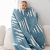 Little kid stretching out blanket to wrap up in - Blue + White Stripe Triangle DOUBLE-LAYER BAMBONI TODDLER BLANKETS - Saranoni