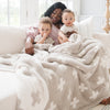 Mom and boys snuggling with beautiful Swiss Cross DOUBLE-LAYER BAMBONI XL BLANKETS - Saranoni