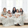 Peterson family snuggled up with meaningful HOPE DOUBLE-LAYER BAMBONI® XL BLANKETS - Saranoni