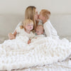 DOUBLE RUCHED FAUX FUR THROW BLANKETS - Best blankets and throws: Saranoni Ruched Minky in a relaxing  bedroom