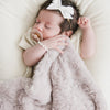 Newborn sleeping with beautiful DREAM MINI BLANKETS - Saranoni