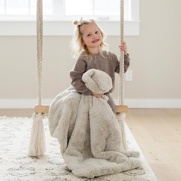 Toddler swinging with DREAM RECEIVING BLANKETS - Saranoni