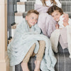 Kids playing and sitting with DREAM TODDLER BLANKETS - Saranoni