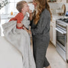 Mom and son in kitchen with DREAM TODDLER BLANKETS - Saranoni