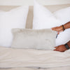 Elegant Saranoni knit pillow cover accentuating a stylish bed setup