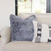 Elegant Saranoni Grand Pillow Cover on a Living Room Couch - Adds luxury and comfort to your living space.