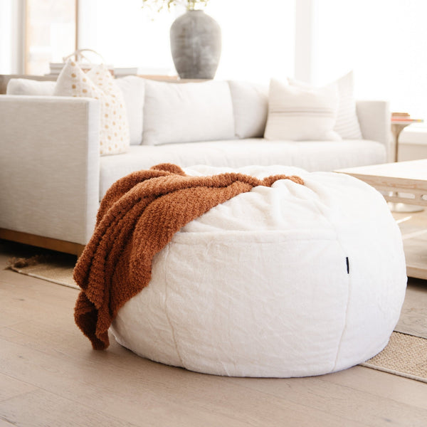 Saranoni Bean Bag in a living room, adding a touch of luxury and comfort to the decor.