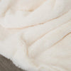 Close-up of the luxurious fabric of the Saranoni Grand blanket.