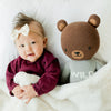 Luxurious Saranoni blanket, perfect for snuggling with your little one.