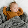 Saranoni grand faux fur blanket providing ultimate comfort for infants.