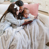 Soft Grand Saranoni blanket perfect for cuddling and reading. 