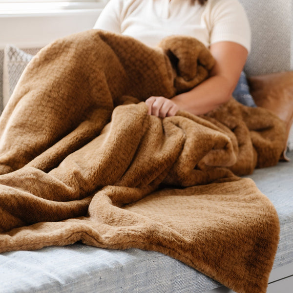 High-quality Saranoni blanket adding elegance to a living room.