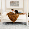 Saranoni throw blanket providing warmth and comfort.